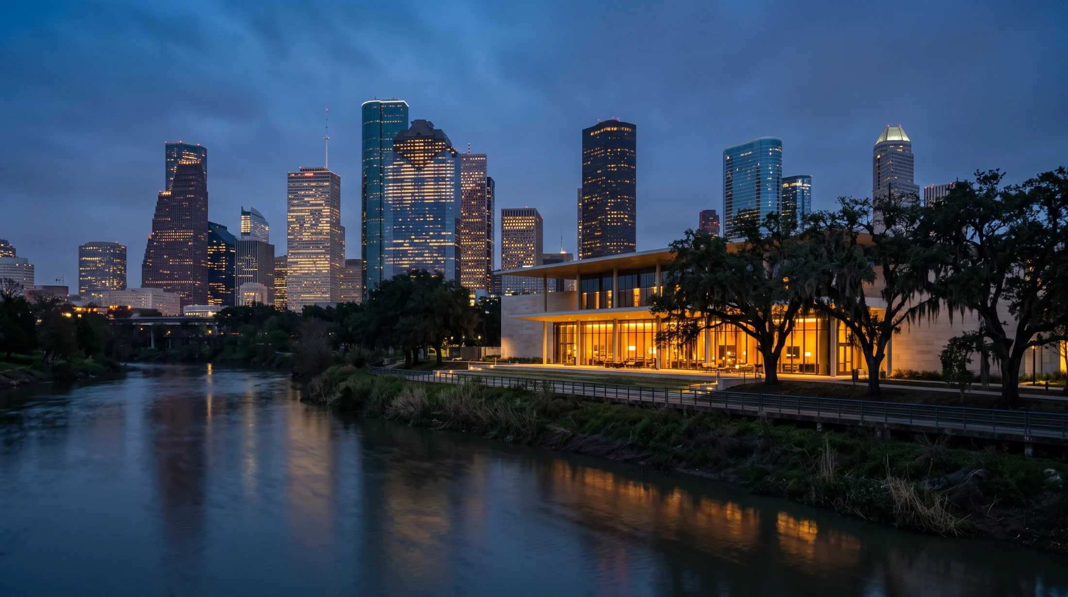 The Houston skyline at dusk from the bayou