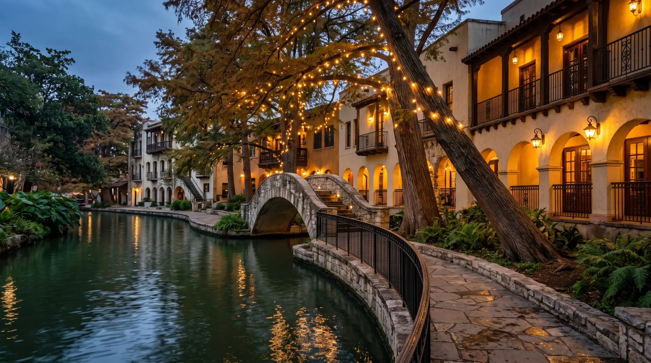 The San Antonio River Walk at evening under the cypresses